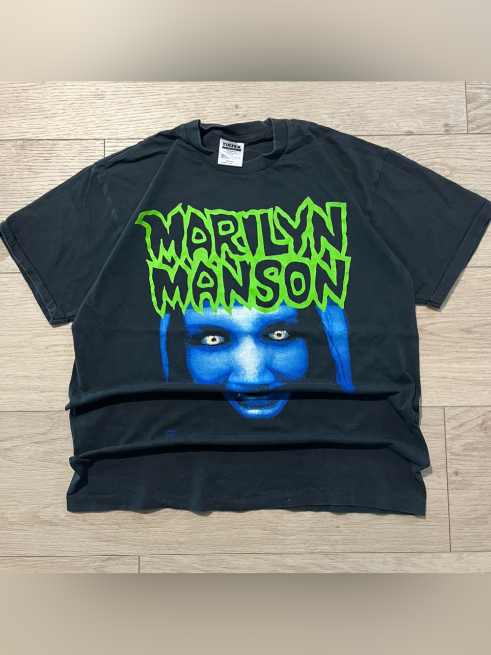 Marilyn Manson Black Graphic Tee with Blue Face and Neon Green Logo